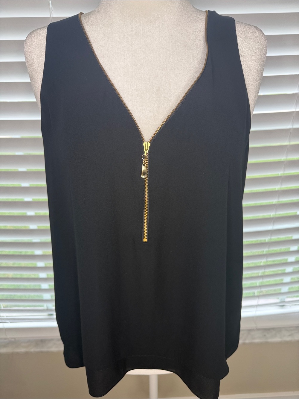 Black Sleeveless V-Neck Top with Gold Zip